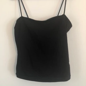 Topp - Svart topp i bomull.