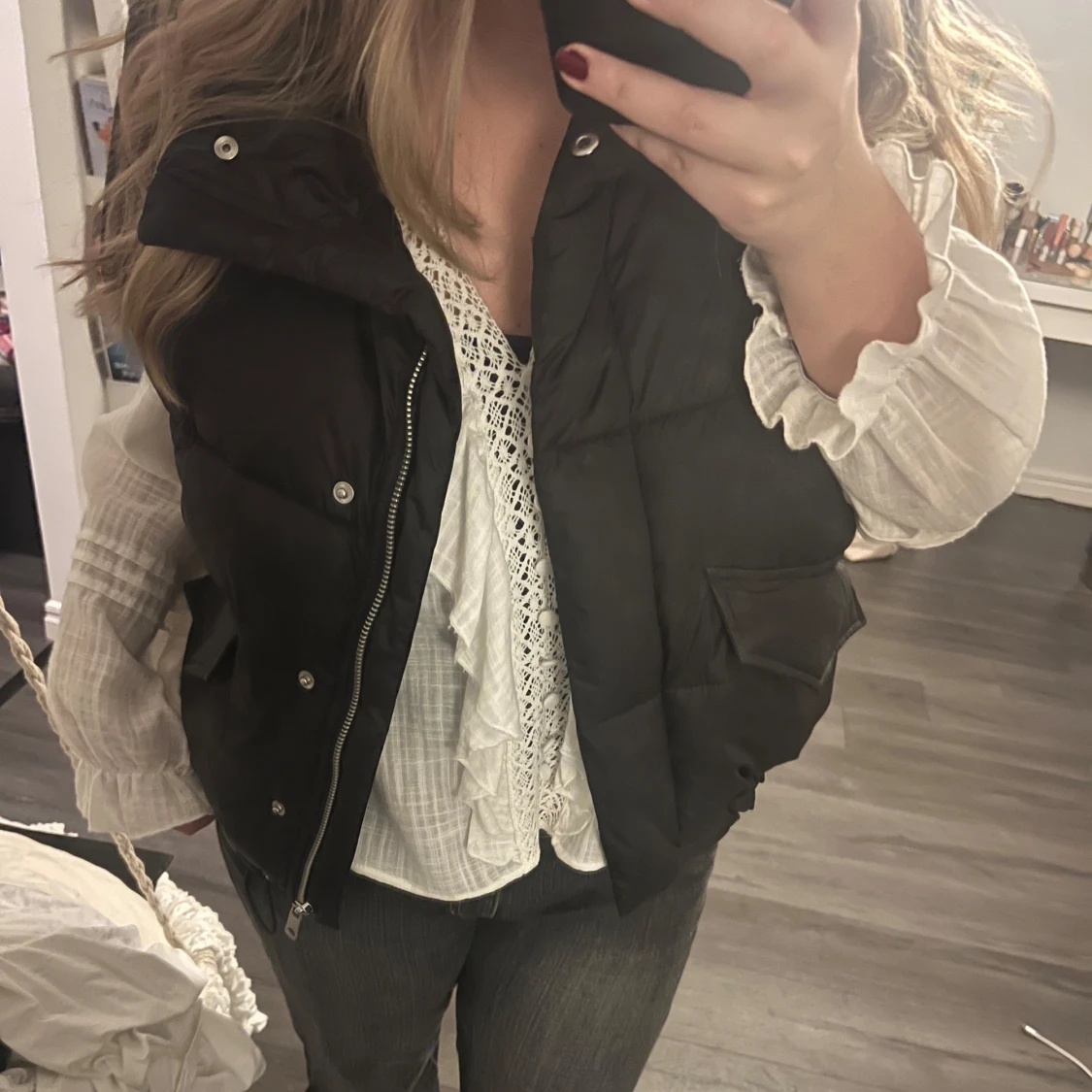 Svart dunväst från H&M