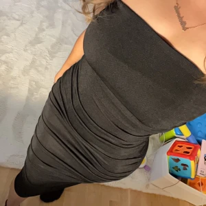 Klänning  - Lång tight klänning utan armar