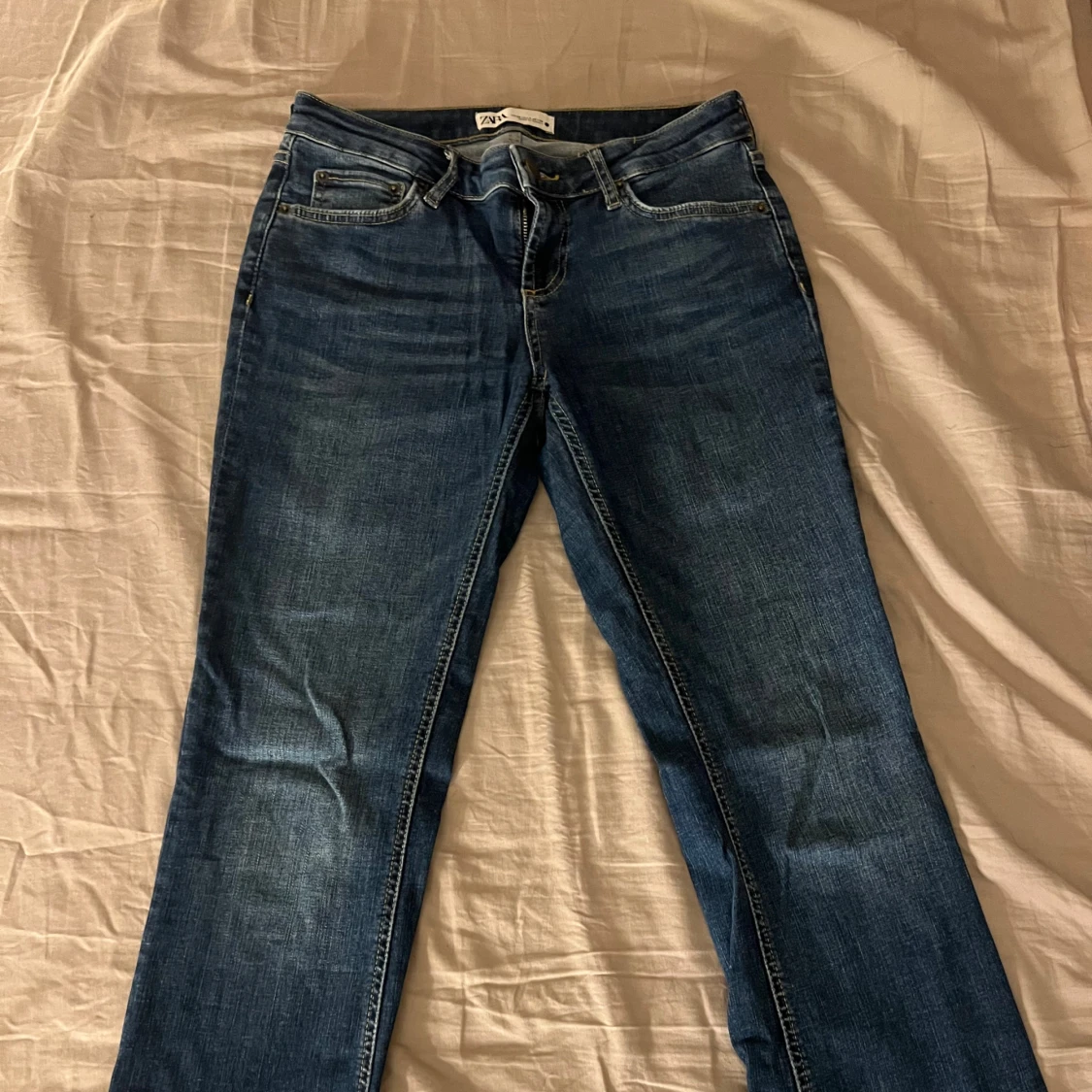 Blå bootcut jeans - 90