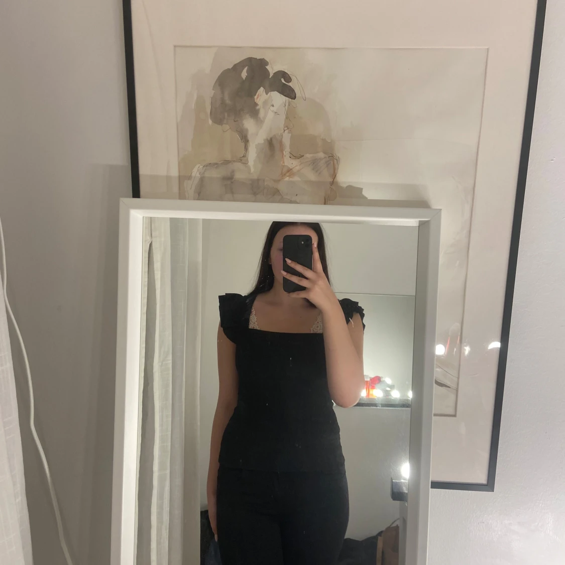 Svart T-shirt med spetsdetaljer - 90