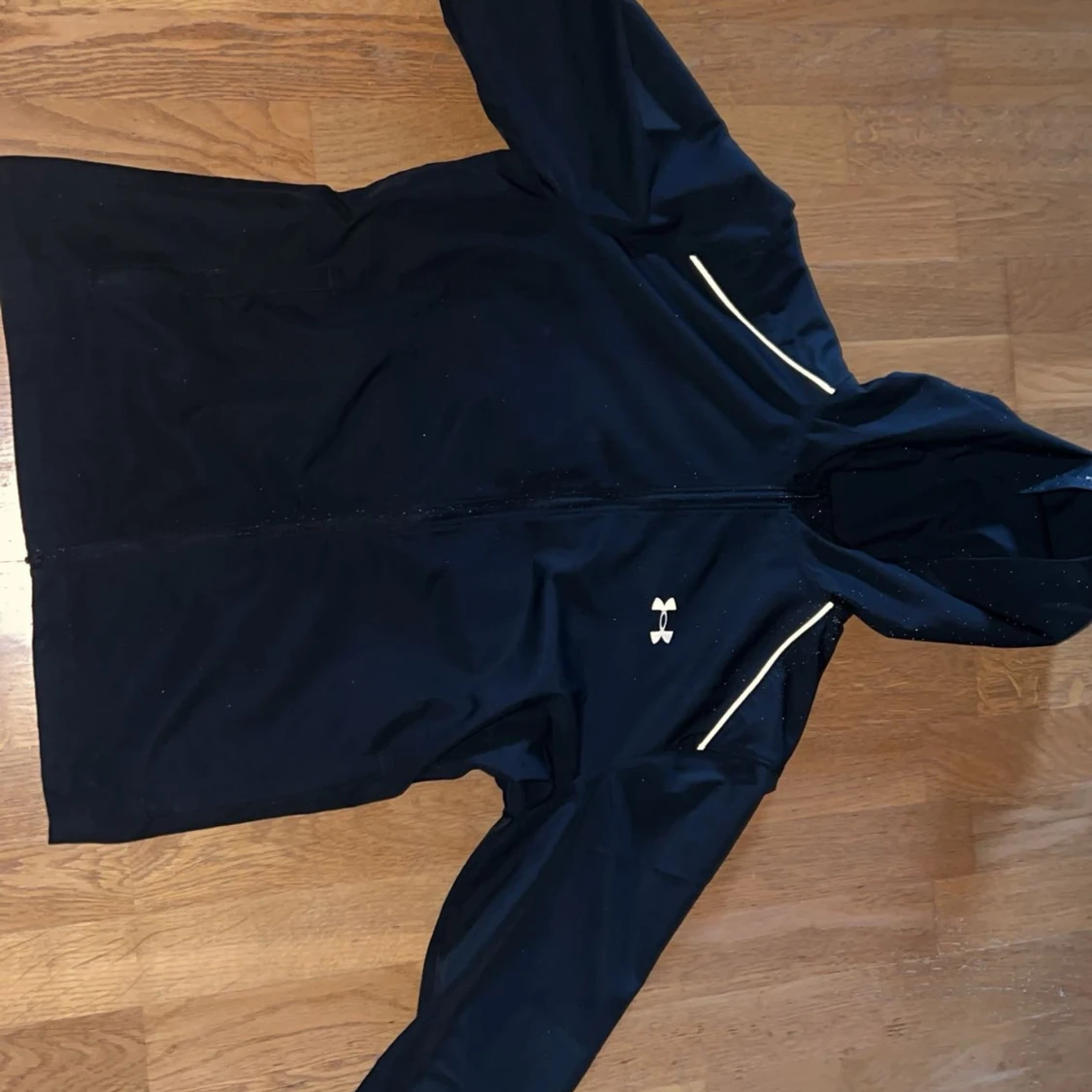 Svart windbreaker från Under Armour