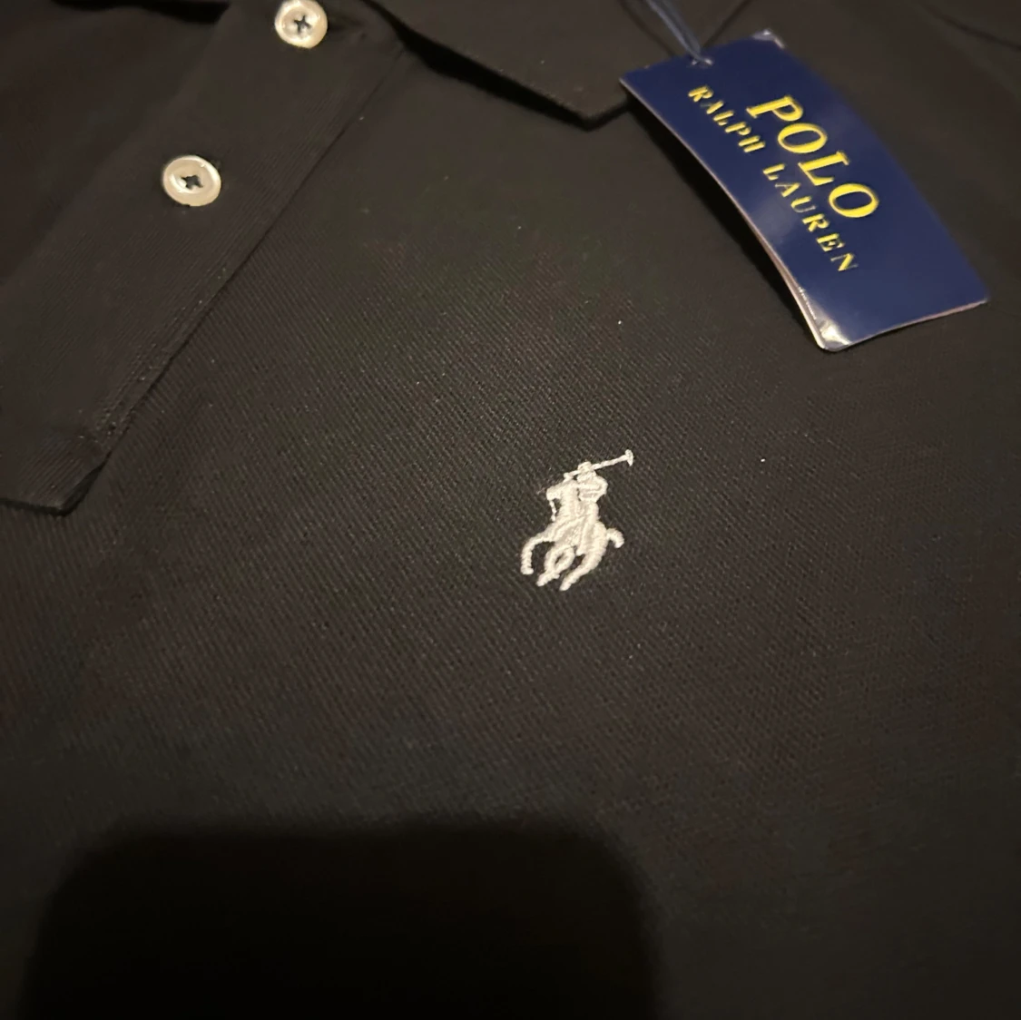 Svart polo piké  - 90