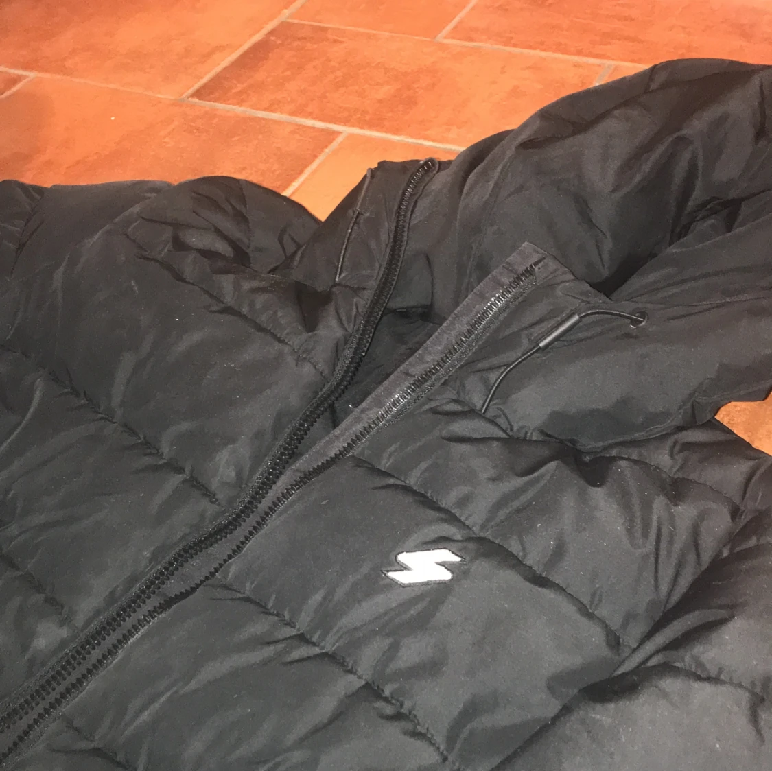 Svart pufferjacka från Superdry - 90