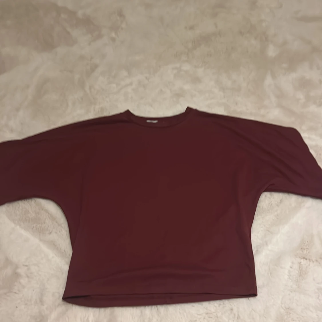 Vinröd tröja från 157