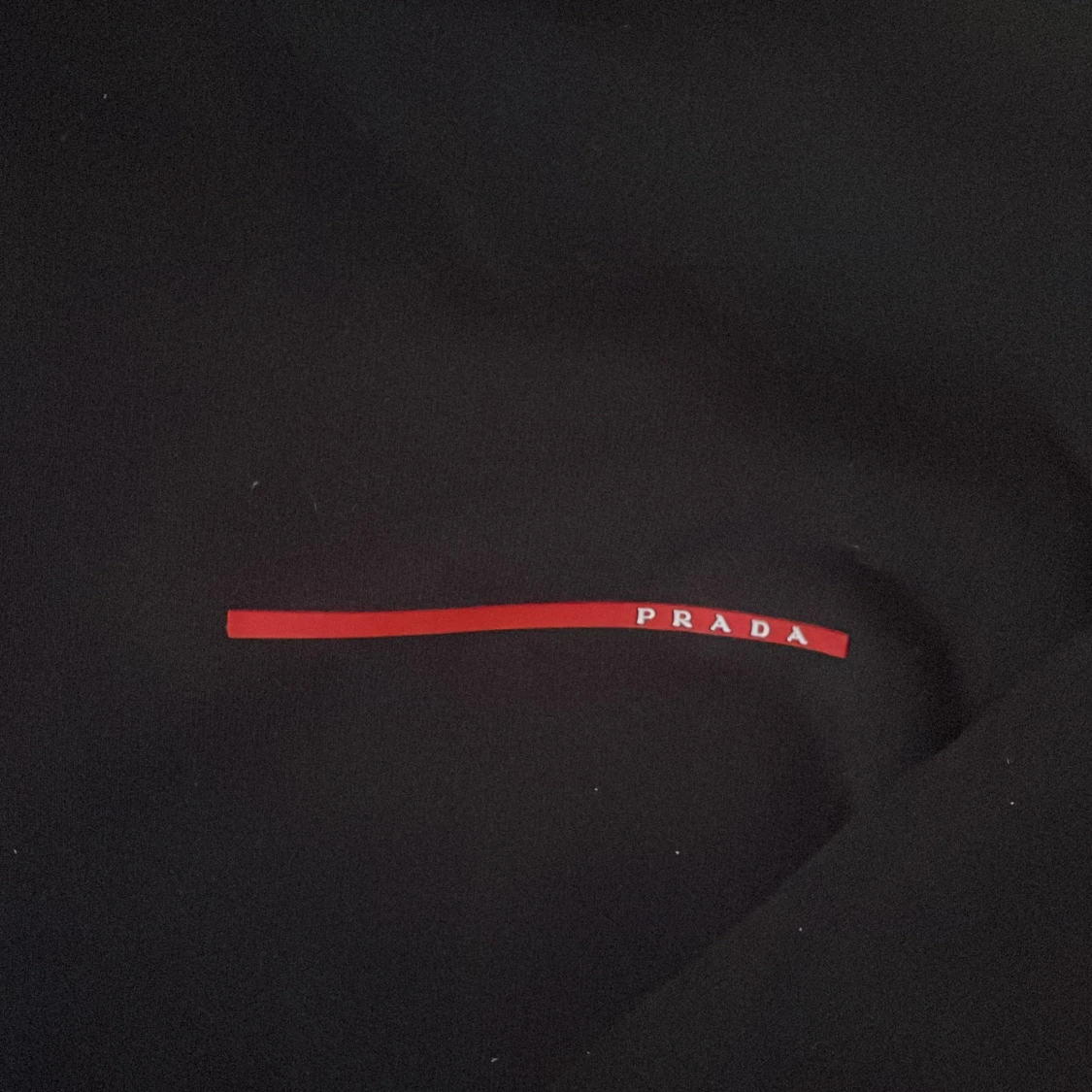 Svart hoodie från Prada - 90