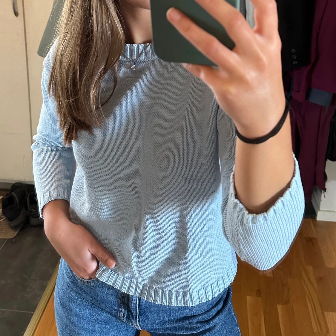 Ljusblå stickad tröja