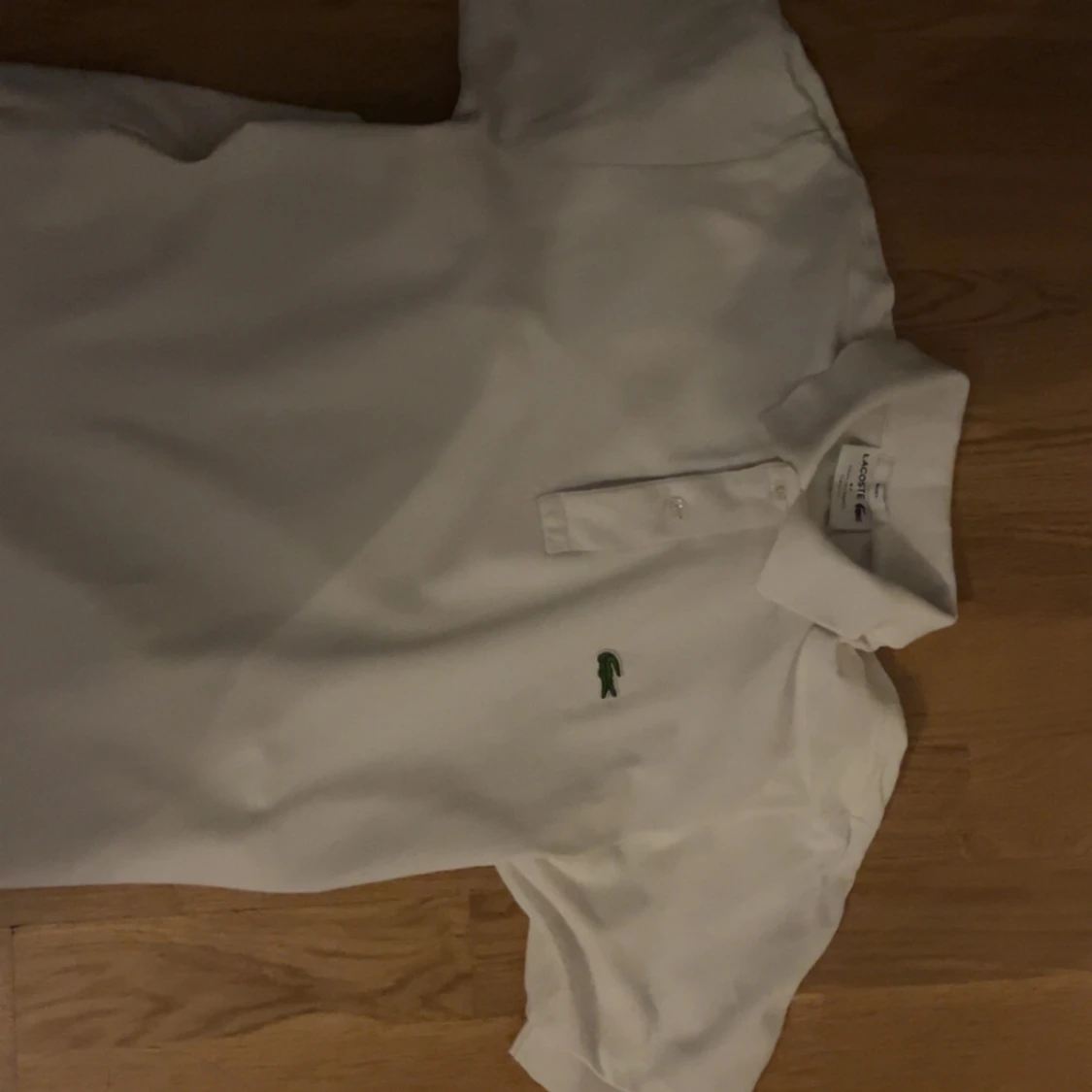 Vit pikétröja från Lacoste - 2