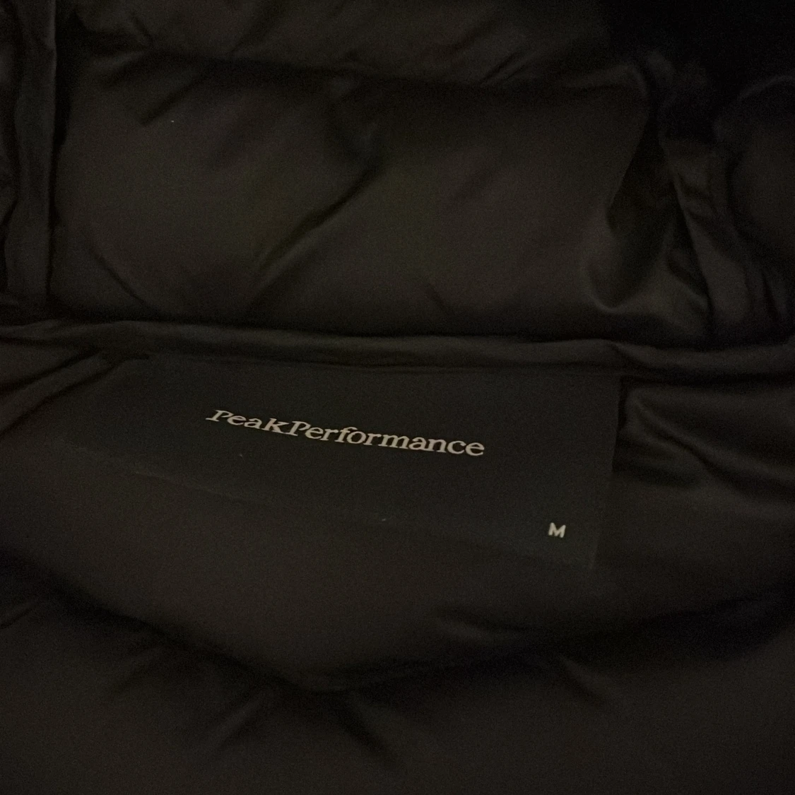 Svart pufferjacka från Peak Performance - 91