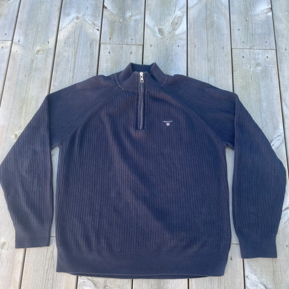 Stickad quarter zip