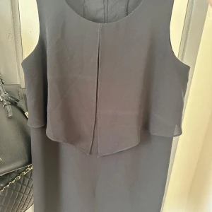 Klänning S - Använd men fint skick! Slutar vid knät.