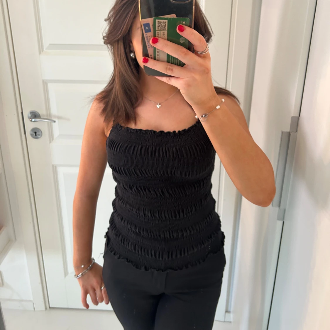 Svart ärmlös topp - 90