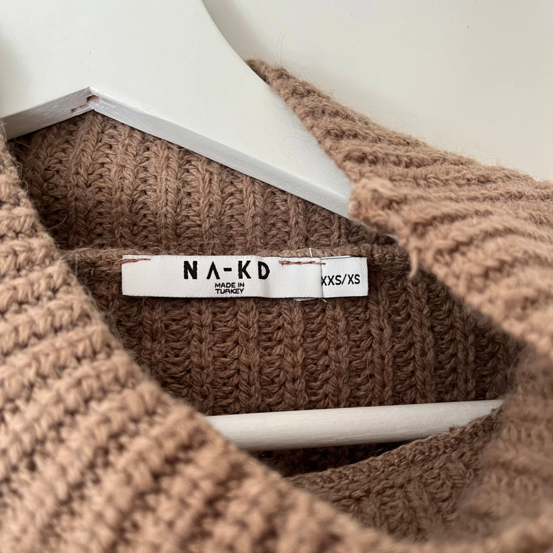 Stickad tröja med vida armar - 90