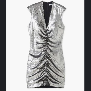 Sequin klänning - Klänning med paljetter från Mango