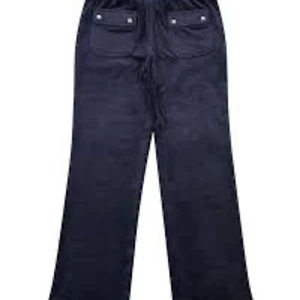 juicy couture byxor  - strl 12 år , lite slitna längst ner men annars bra skick, köptes för 800