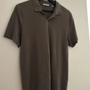 Bläck pike - Storlek m Kom aldrig till användning 