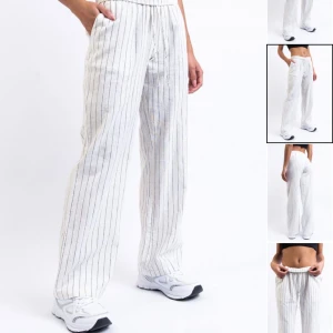 Mid Waist Linnebyxor från Madlady oanvända  - Mid Waist Linnebyxor - Mila White Stripe från Madlady. Stl M regular. Passar 165-173 cm. Läs mer om vilken längd som passar på madladys hemsida