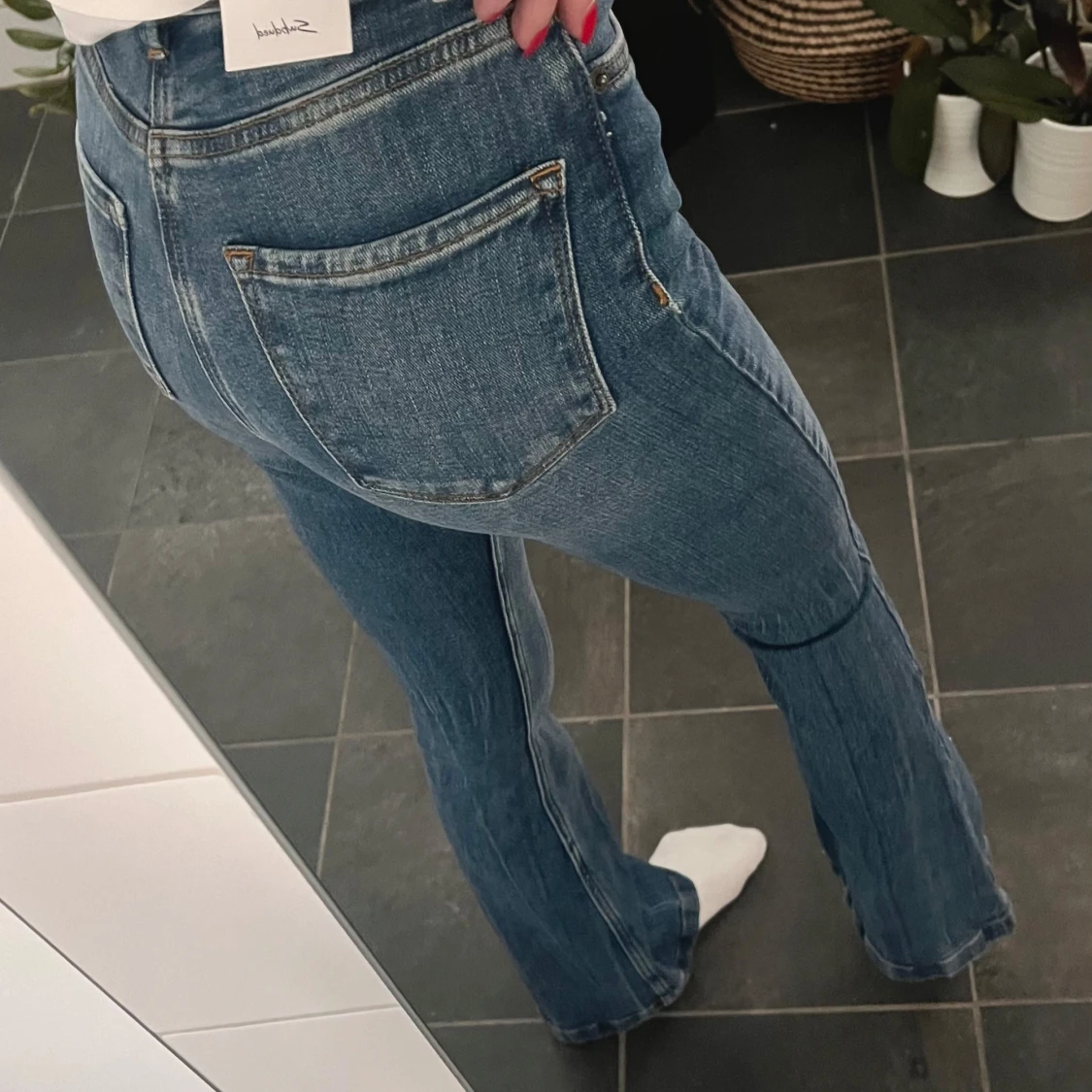 Subdued Bootcut Jeans - 90