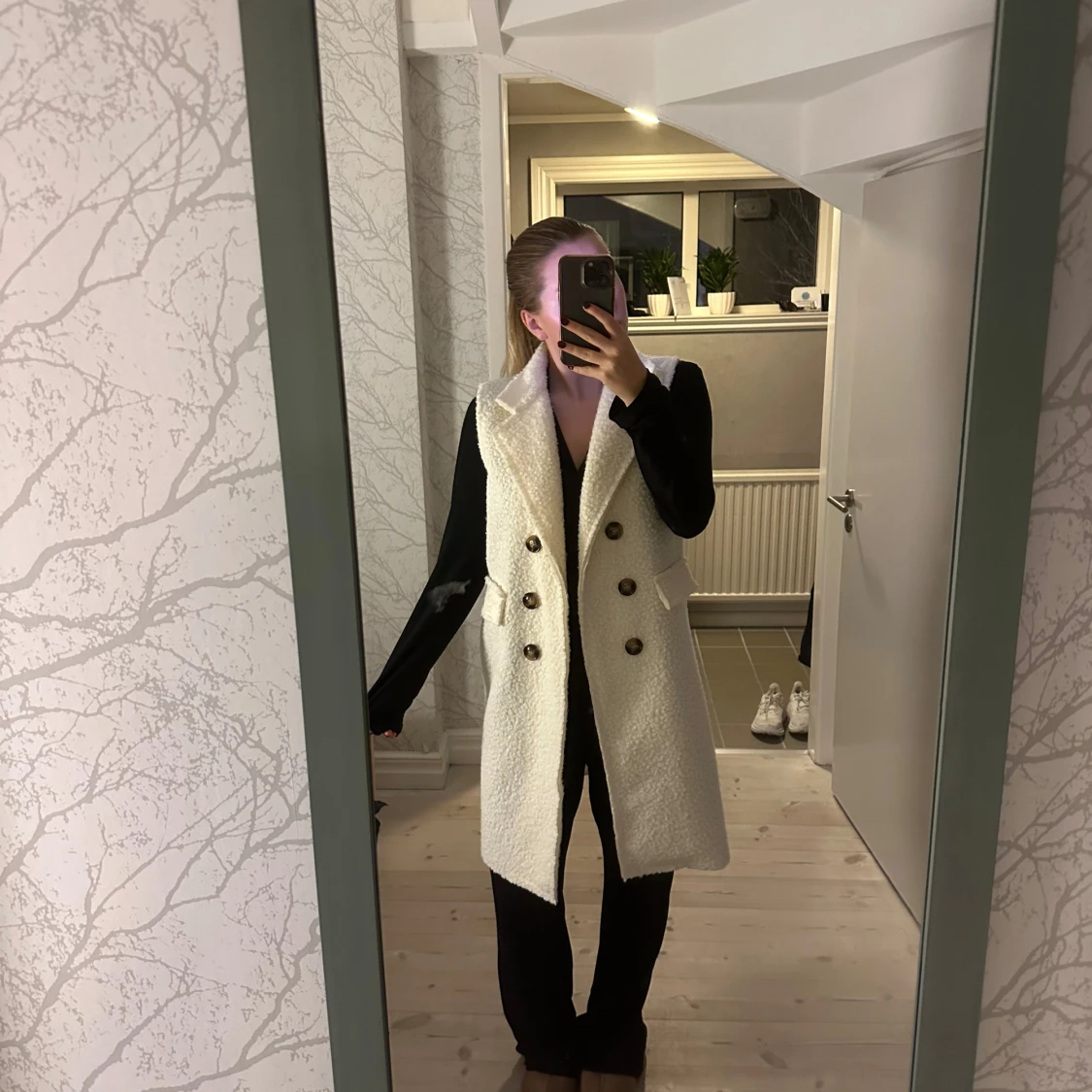 Vit väst med knappar