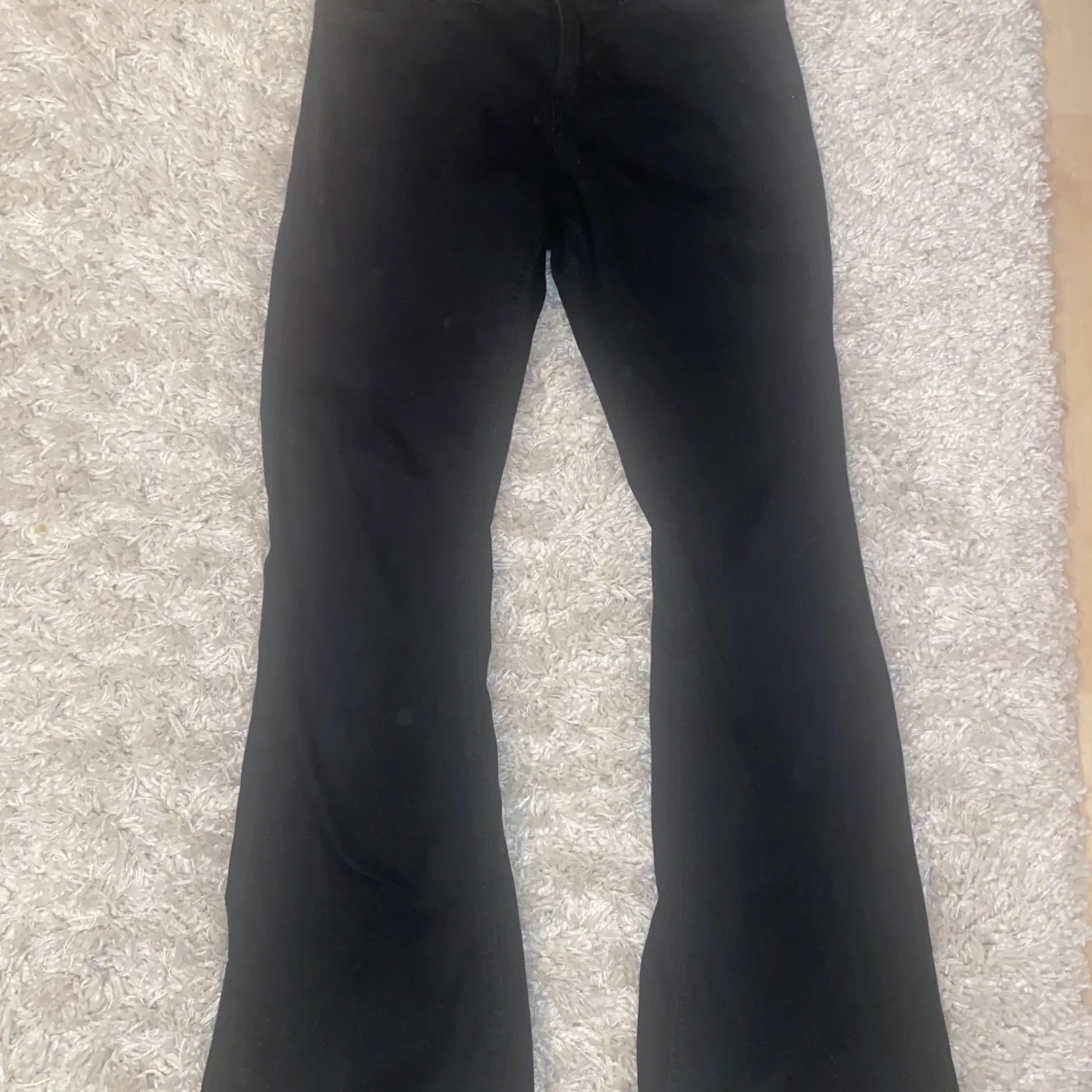 Svarta bootcut byxor