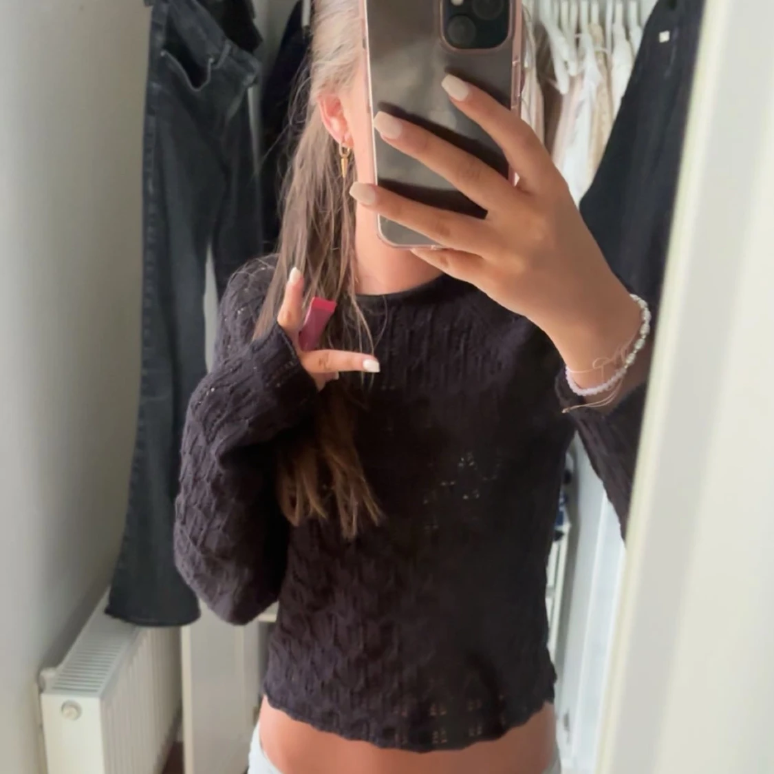 Svart stickad tröja