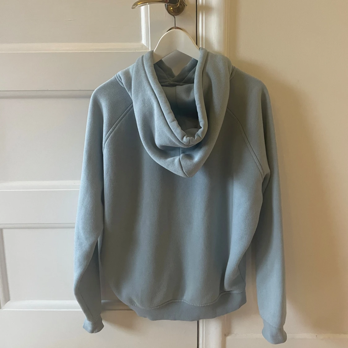 Ljusblå hoodie - 90