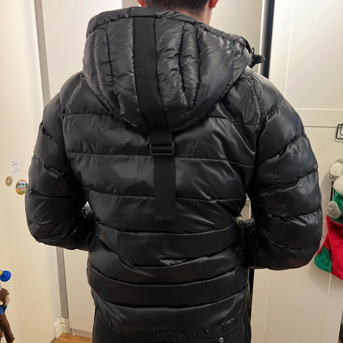 Svart dunjacka från Peak Performance - 91