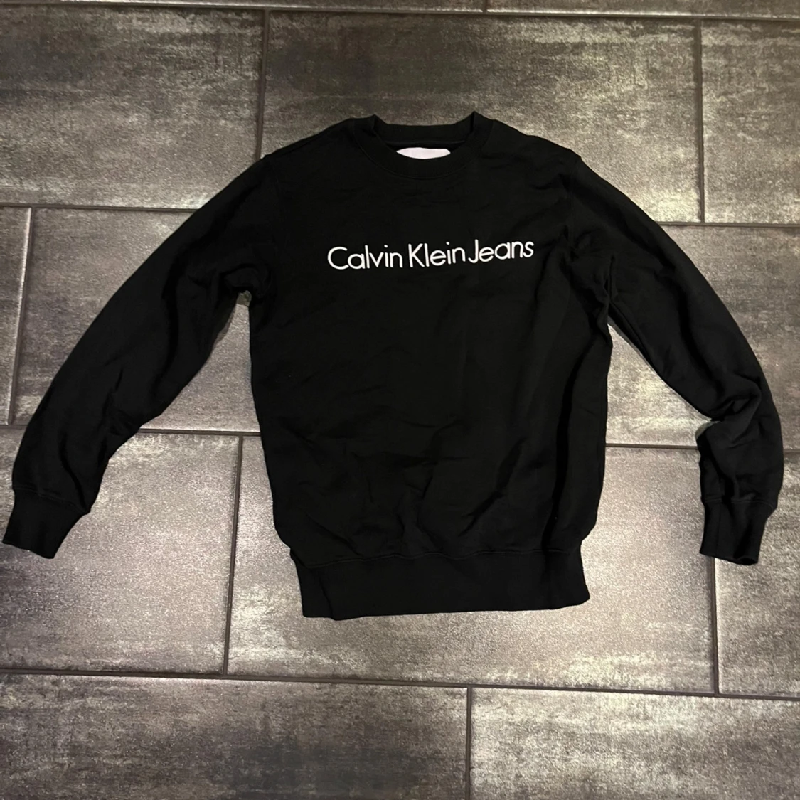 Svart sweatshirt från Calvin Klein Jeans
