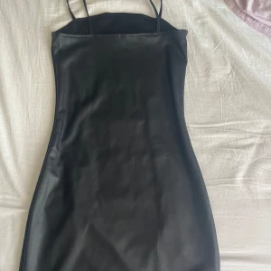 Klänning  - Läderklänning