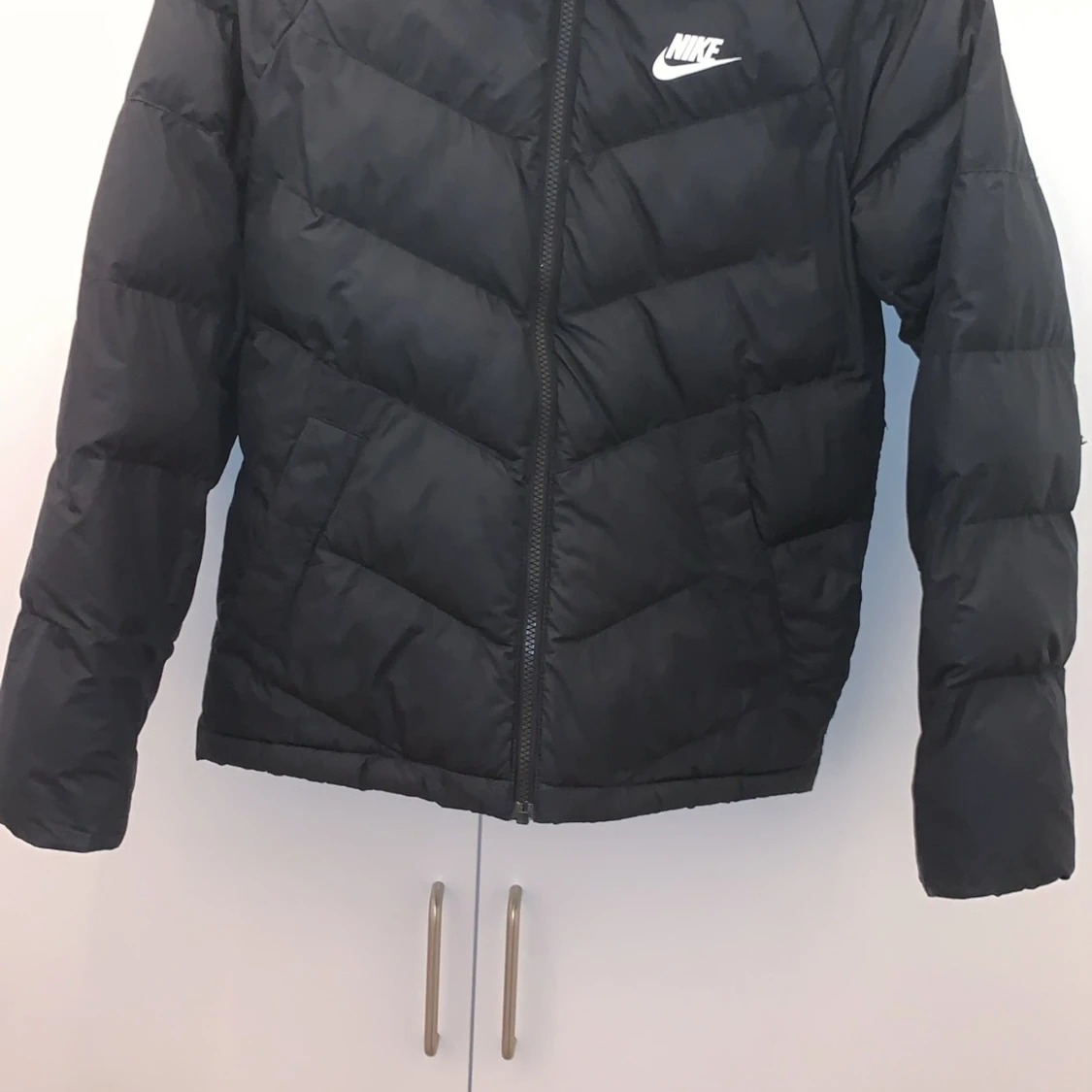 Svart pufferjacka från Nike - 91