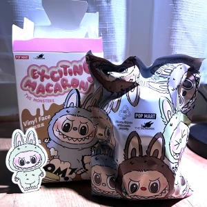 Exciting Macaron The Monsters Labubu - Green Grape Labubu Macaron from Pop Mart. Brand new & unopened bag, still in original blind bag  packaging. The box has been opened (not the bag) to check for the secret figure.  Bought from Popmart’s official website & can show you the receipt If you want proof. 