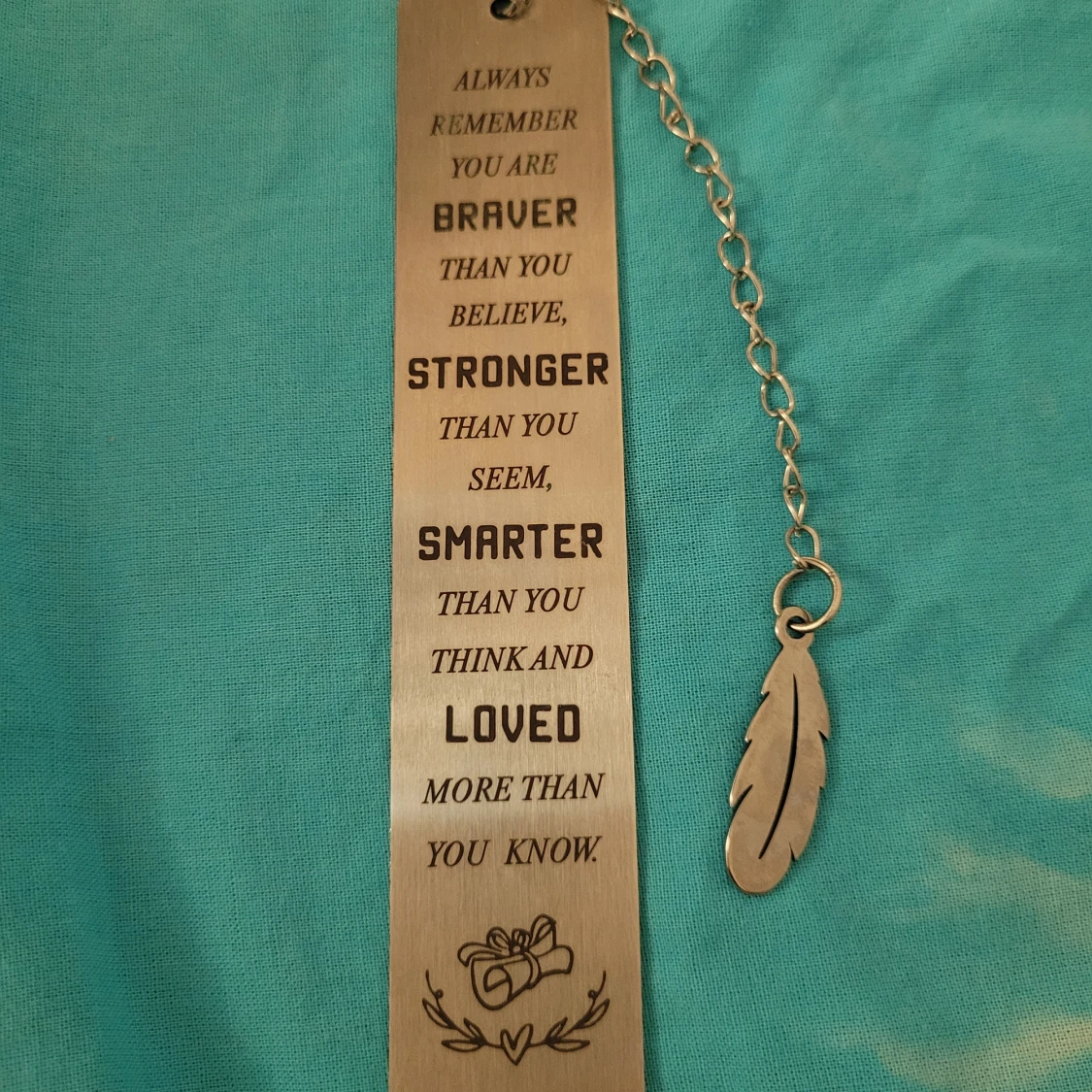 Metallbokmärke med inspirerande citat