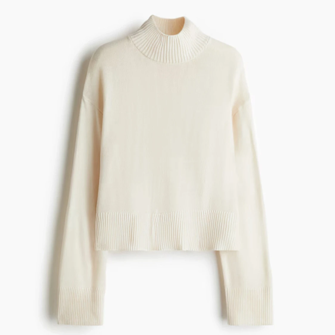 Vit stickad polotröja