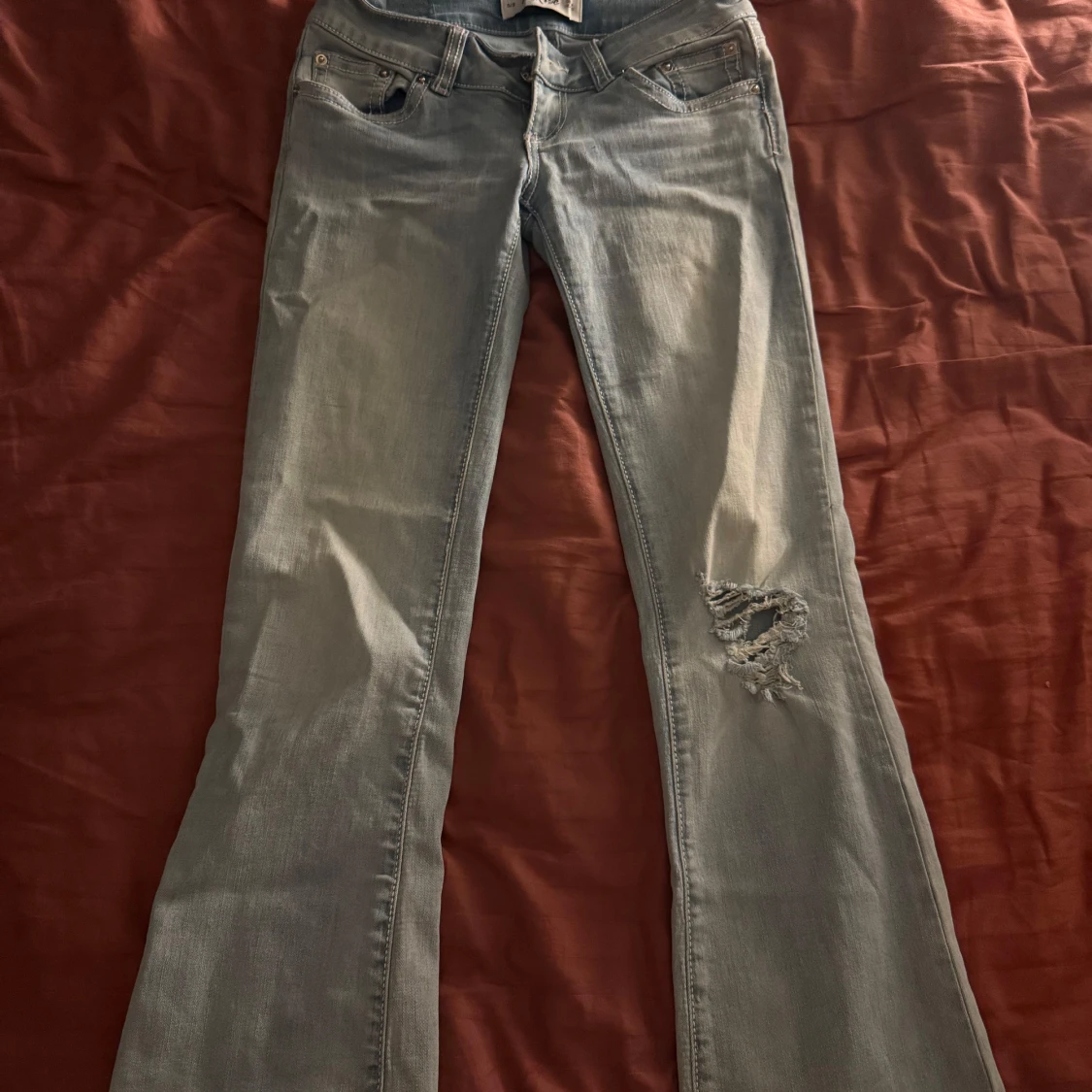 Ljusblå bootcut jeansbyxor super low rise g rise - 1
