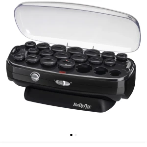 Värmespolar - Säljer ett set med svarta värmespolar från BaByliss Paris. Setet innehåller flera olika storlekar av spolar samt klämmor att sätta fast dom i. Perfekt för att skapa volym och lockar i håret enkelt och snabbt. Använd fåtal gånger