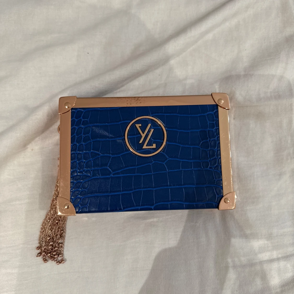 Blå kuvertväska från Yves Lansac