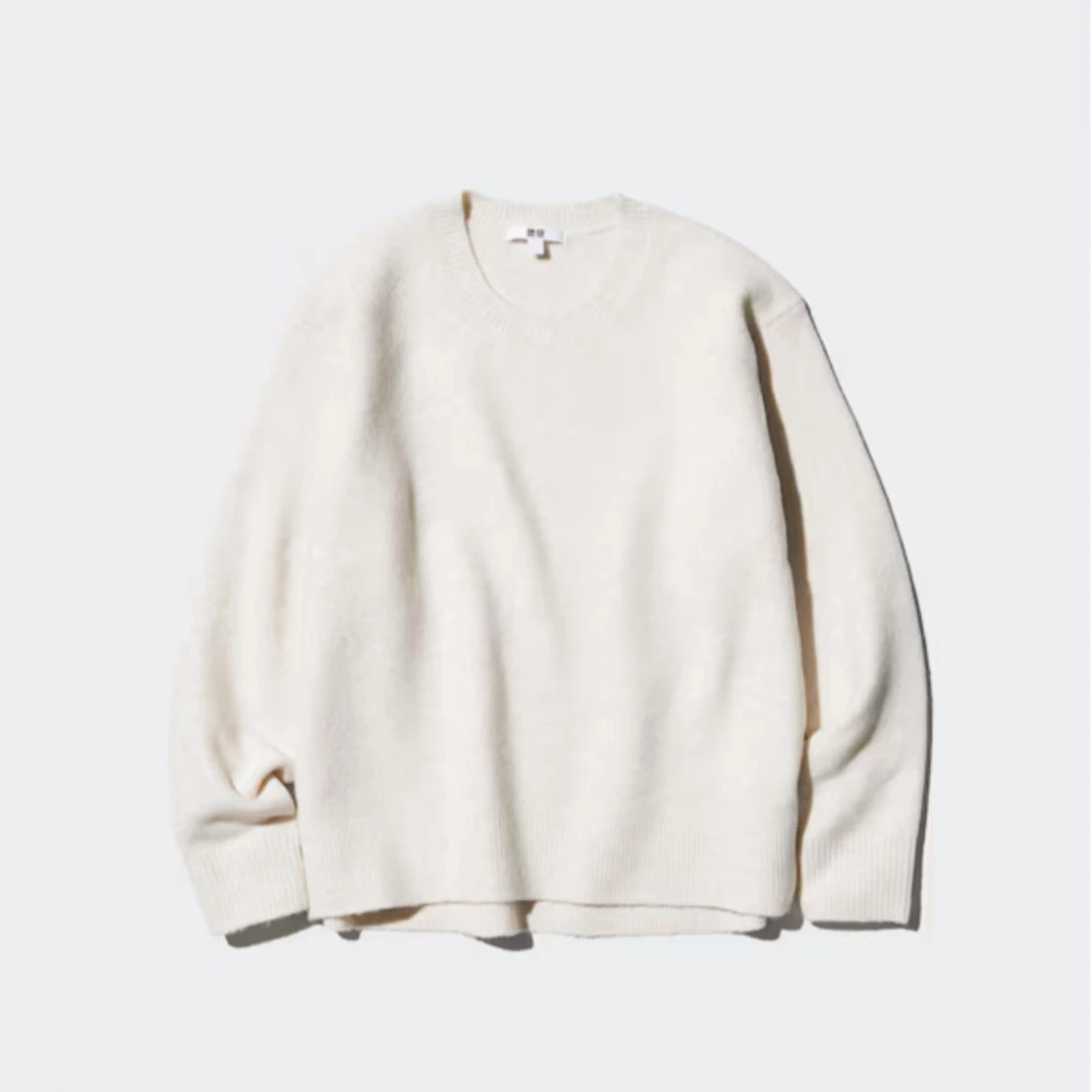 Krämvit stickad tröja 