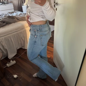 Ljusblå bootcut jeans från ASOS - Aldrig använda 