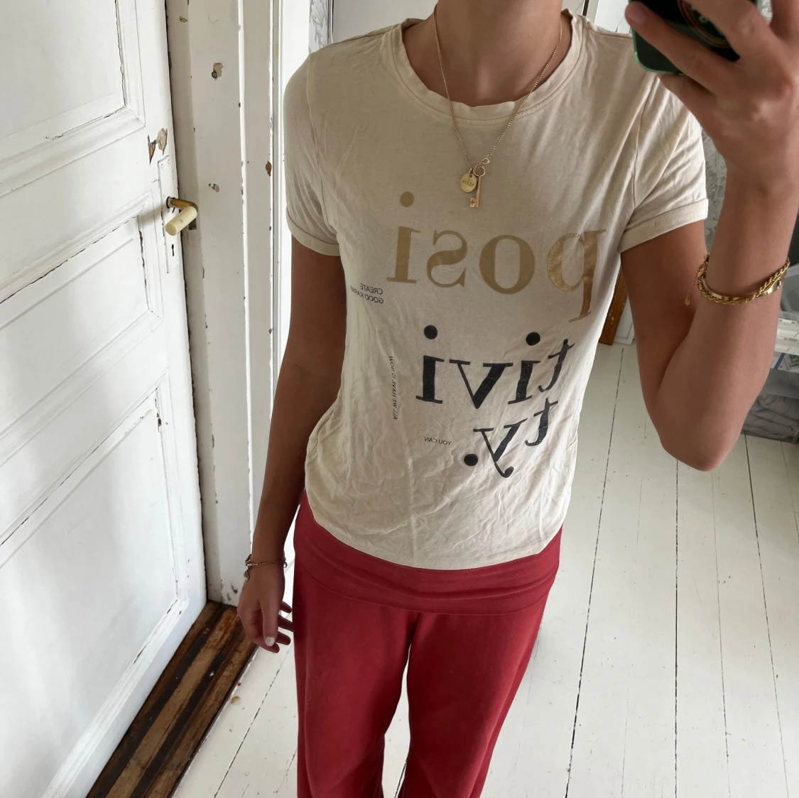 Beige t-shirt med tryck från Name It - 1