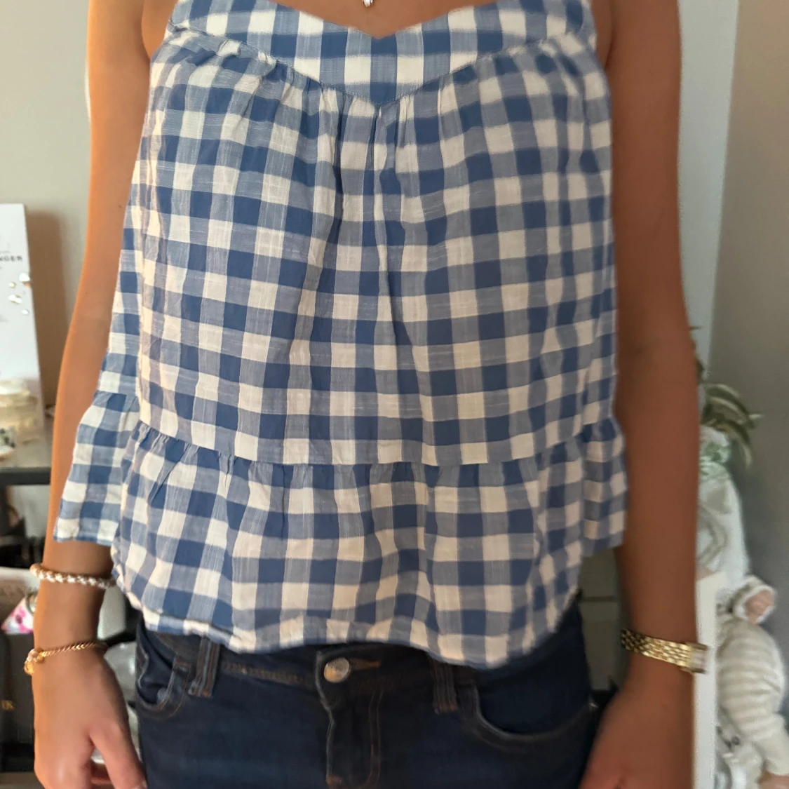 Blåvit rutig linnetopp med volang från GAP - 1