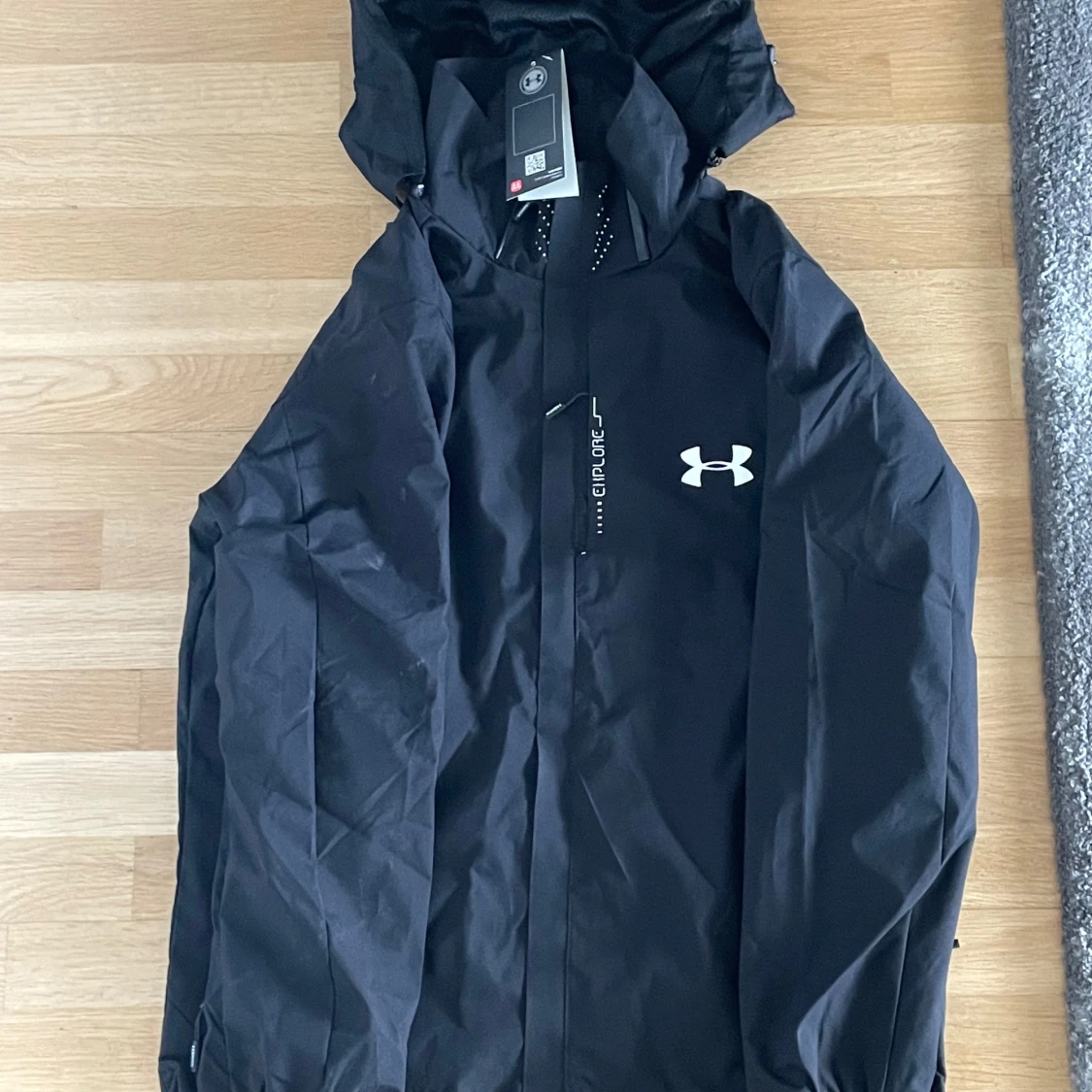 Svart vindjacka från Under Armour