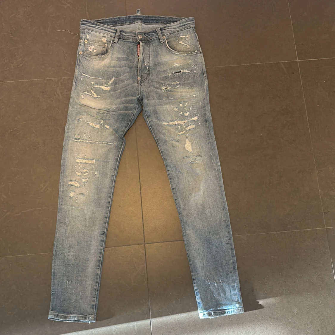 Dsquared2 ljusblå slitna jeans