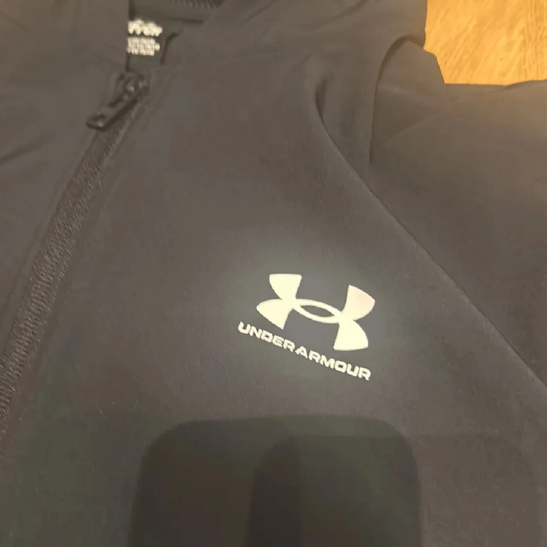 Svart jacka från Under Armour - 1
