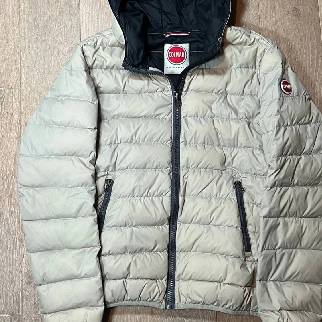 Beige dunjacka från Colmar