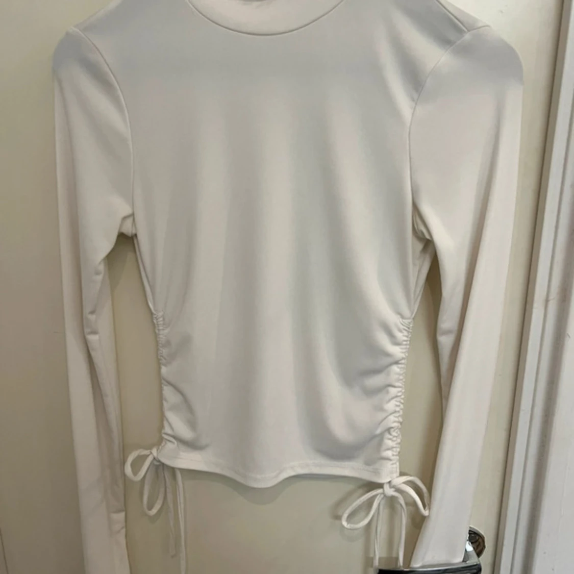 Vit långärmad topp från chiquelle