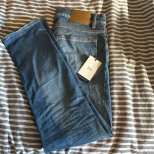 Tiger of Sweden  - Ett par blåa tiger of sweden jeans. Super bra skick, 9/10. St: 29/32. Modell: pistolero 