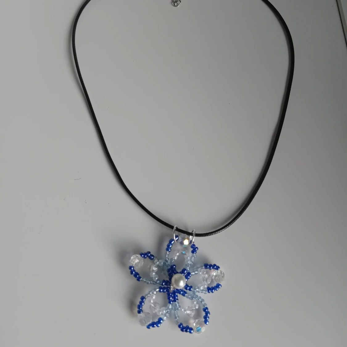 Halsband blå blomma - 1