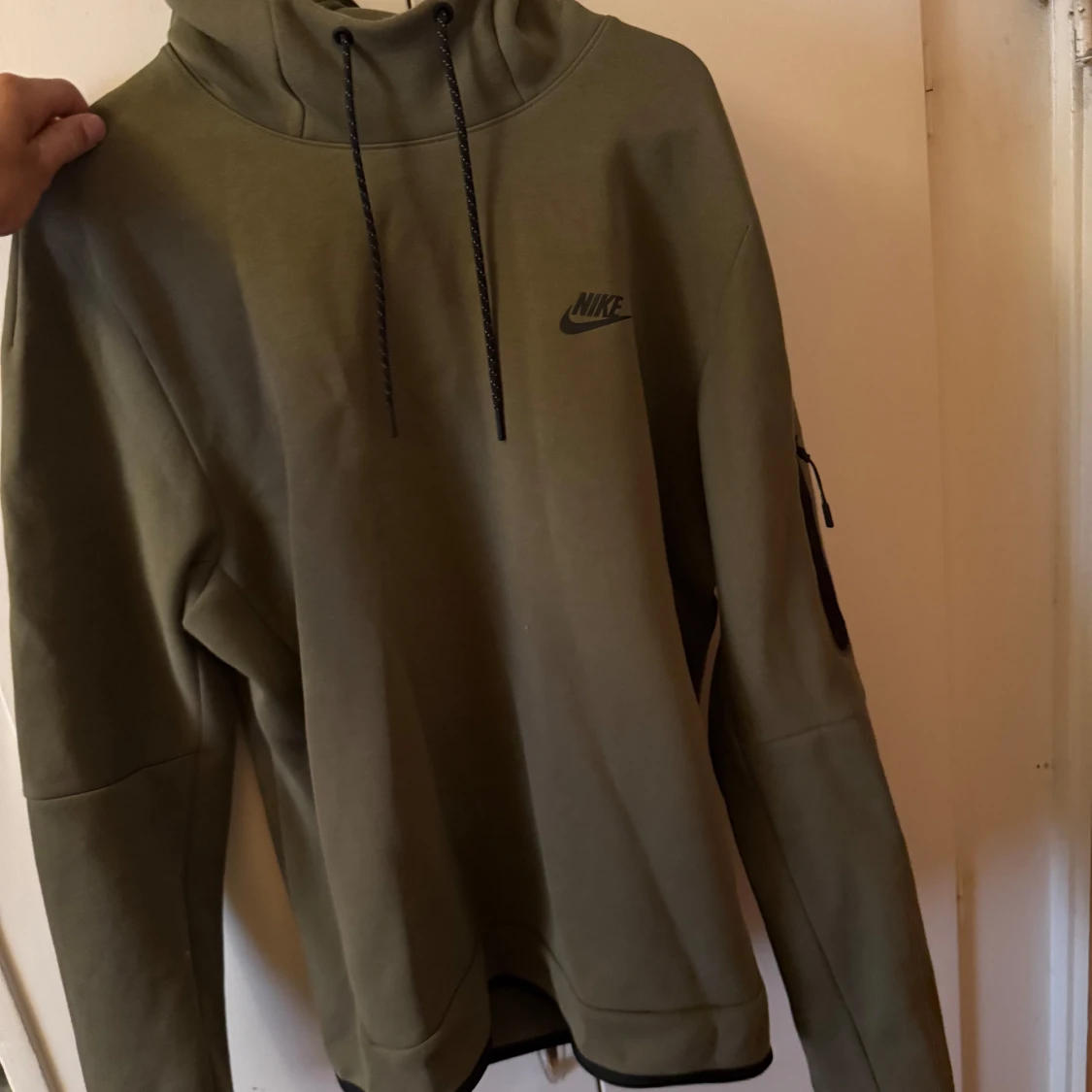 Grön Nike hoodie med huva