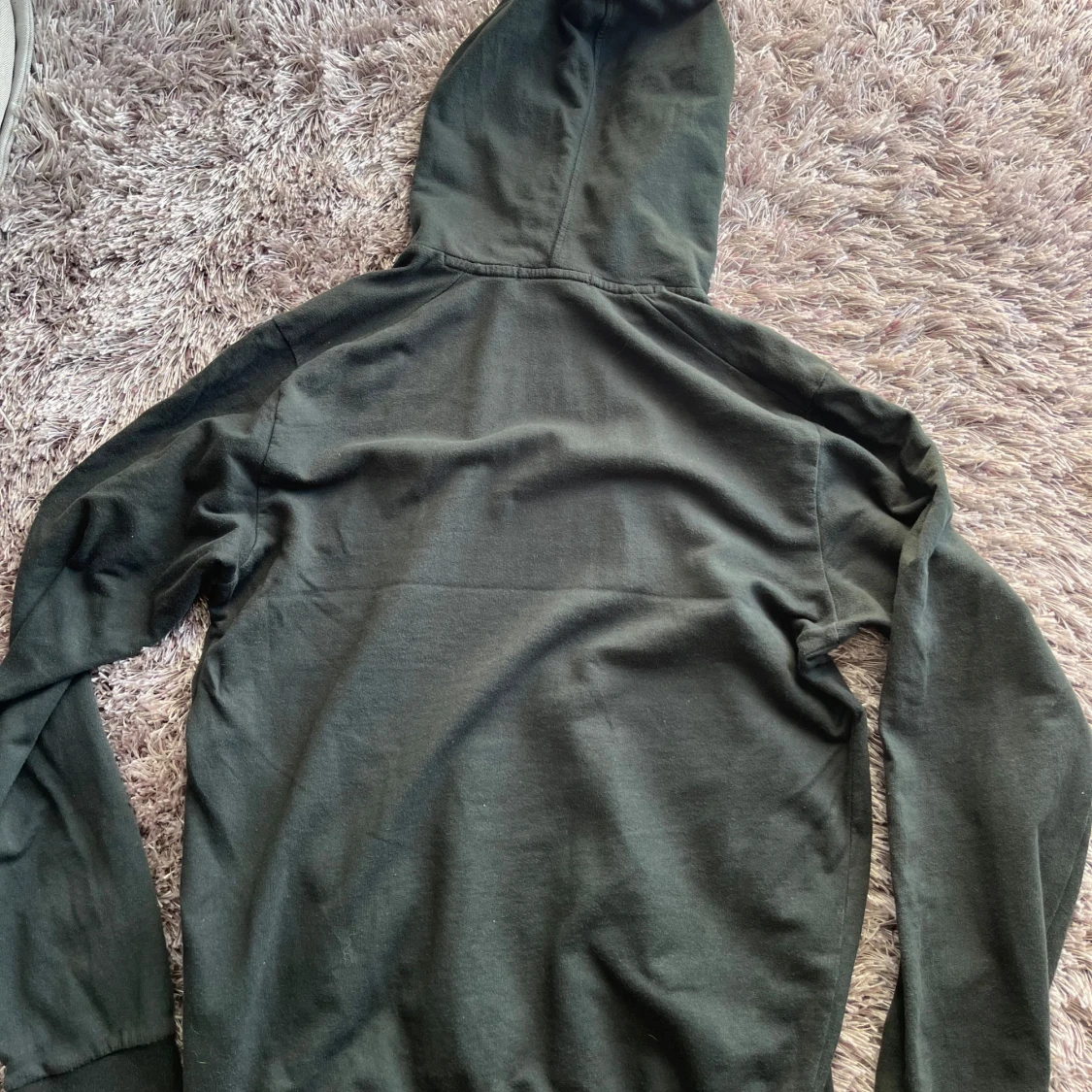 Mörkgrön hoodie från Stone Island - 1
