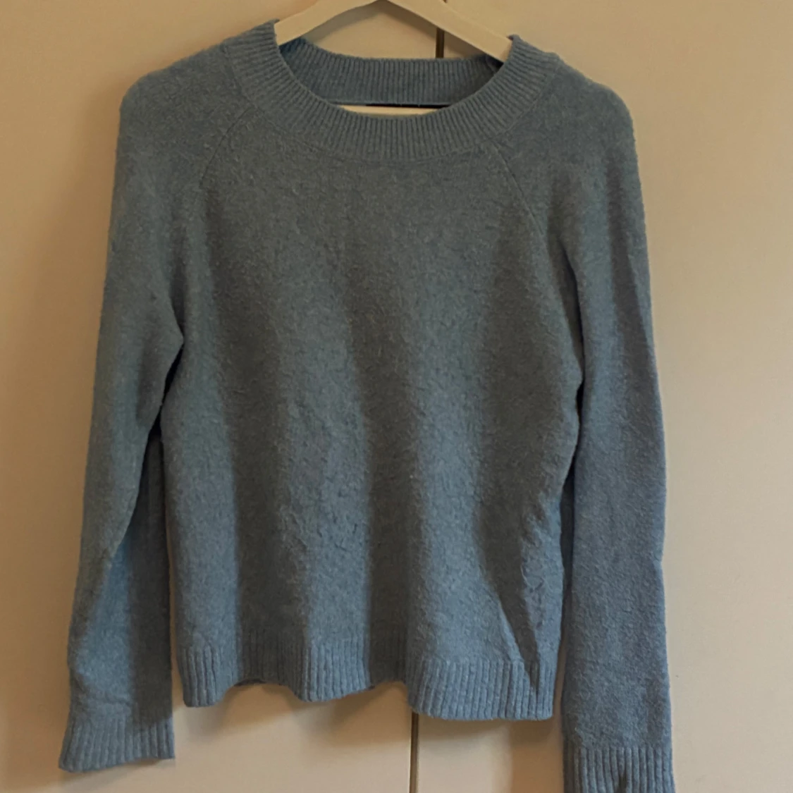 Blå stickad tröja